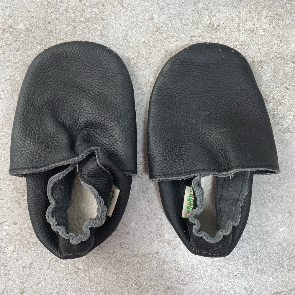 Soft sole leather baby shoes, black with gray-brown soles